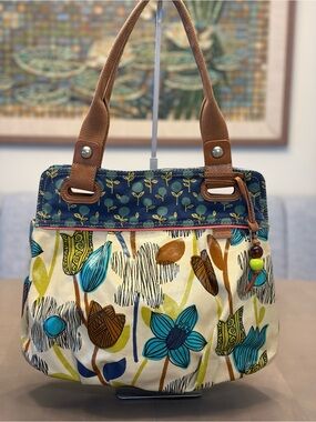 Fossil Floral Tote Bag w/2 Beaded Charm & Magnetic Closure Cream, Blue & Brown